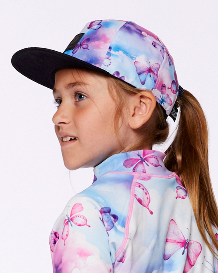 Printed Cap Butterflies On Multicolored And Black Background
