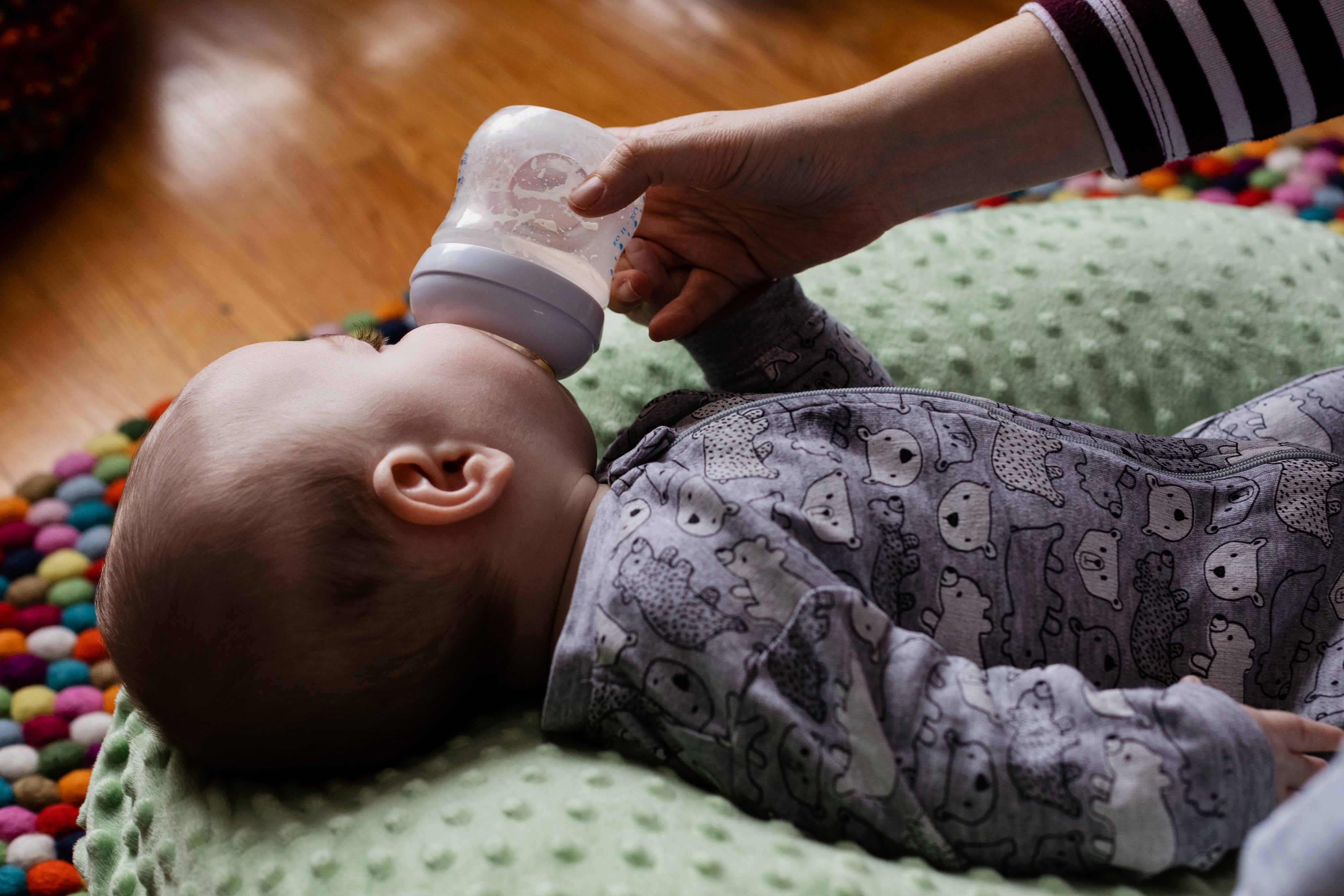 baby-feeding-on-beanbag - Tiniest Toes