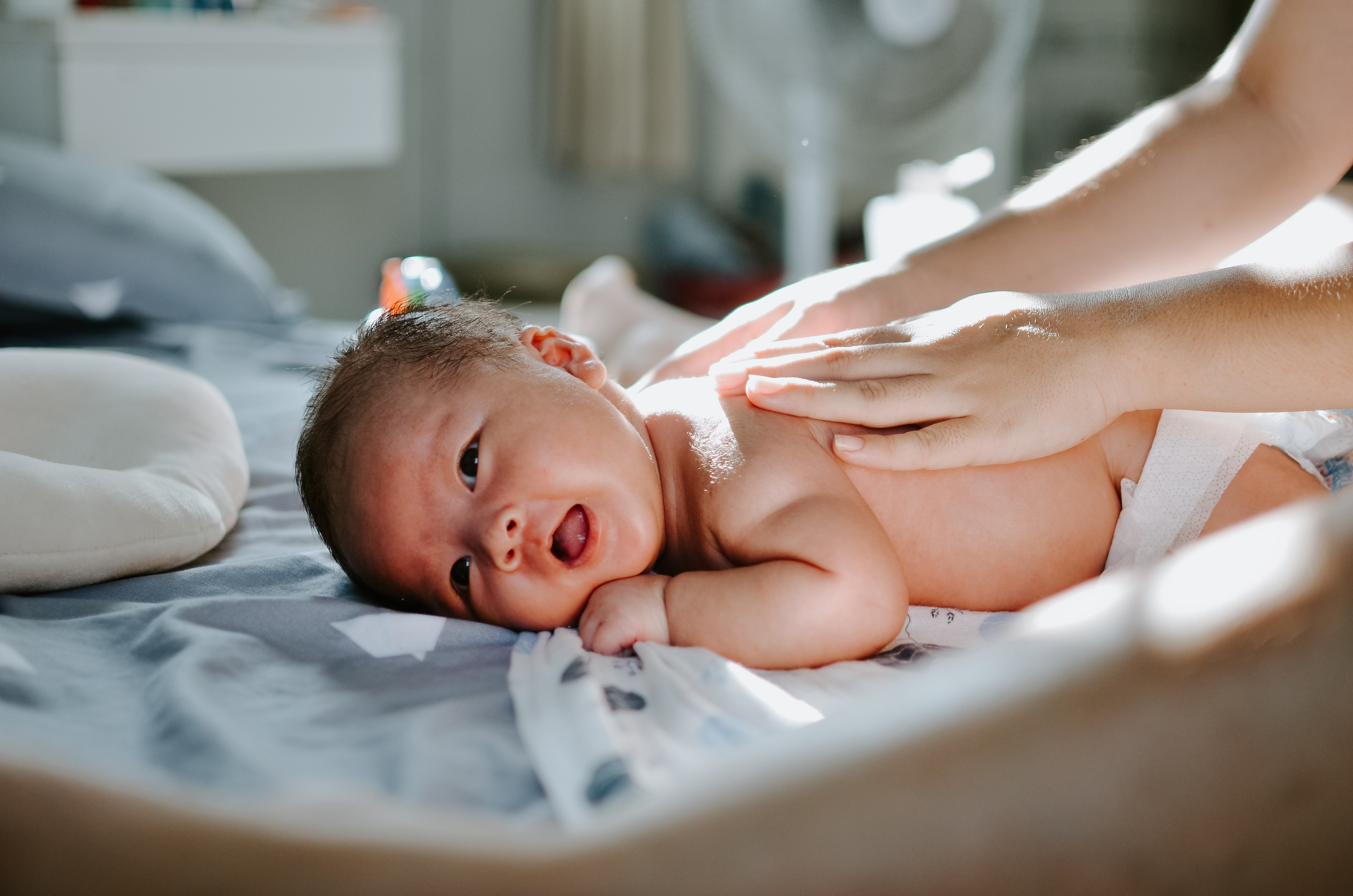 baby-soothed-with-baby-oil - Tiniest Toes